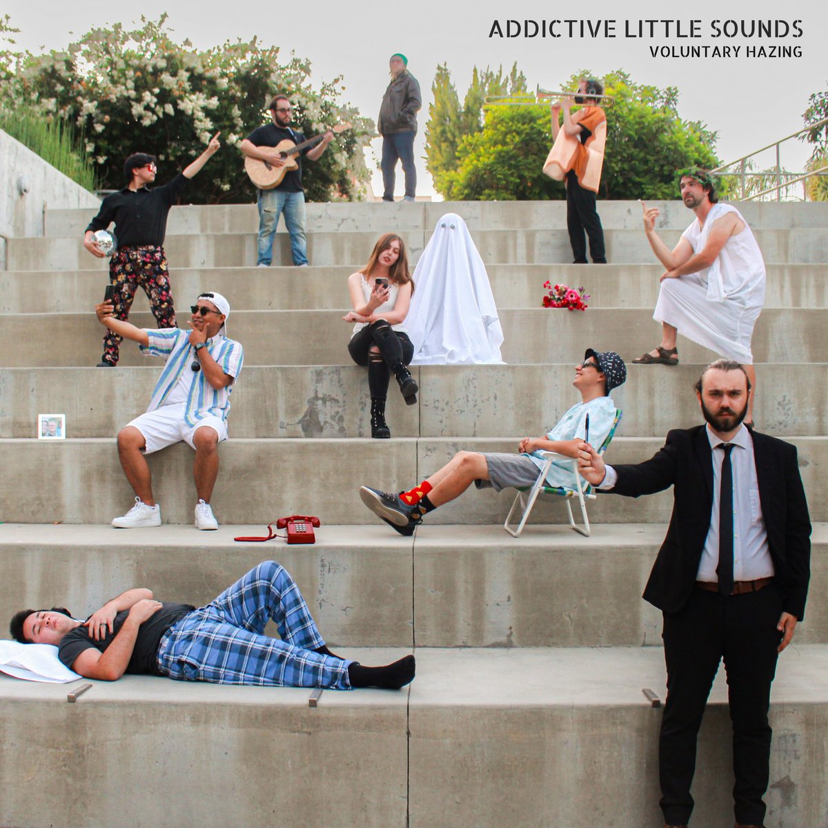 Album art for Addictive little sound by Voluntary Hazing. The band is standing dispersed on several steps and there is a ghost there. as well